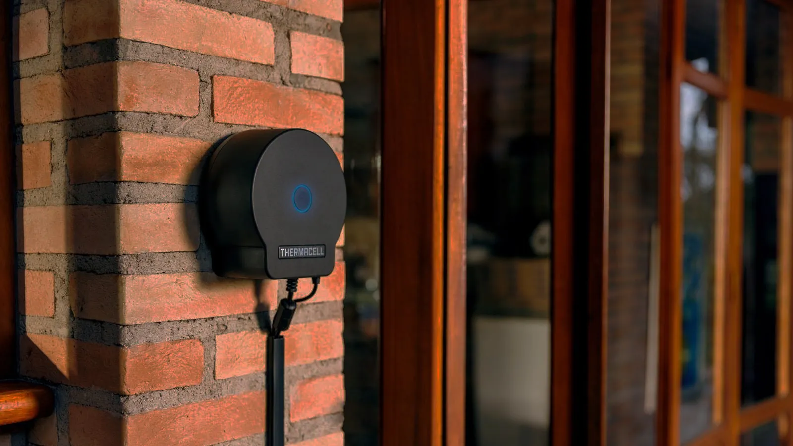 Thermacell LIV 2.0 smart hub wall-mounted beside a doorway